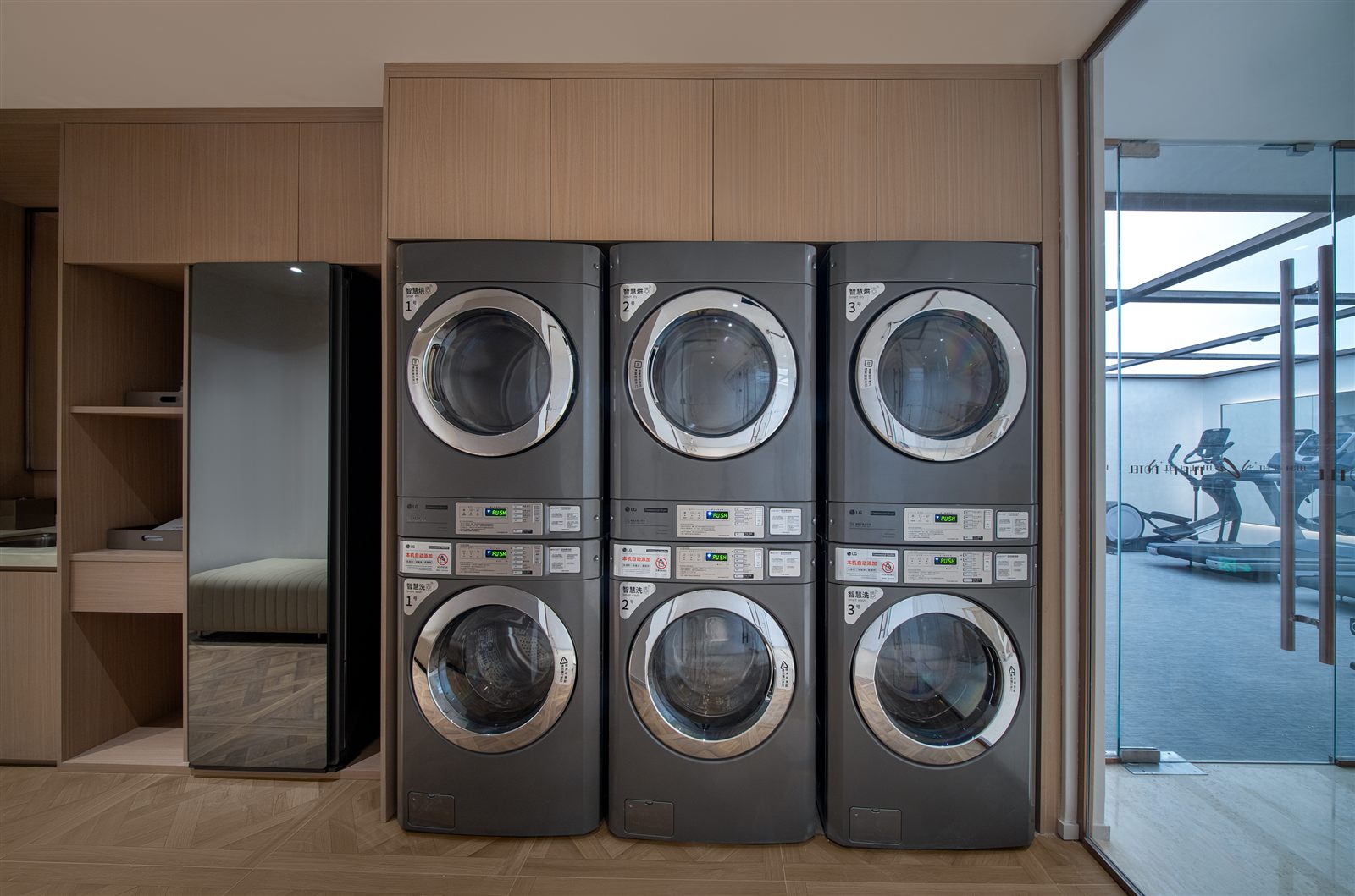 Laundry room at H+ Hotel
